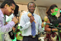 Minister Collins Chabane who is also a musician in his own right joins the Mozambican band that entertained guests during the State Banquet Dinner hosted by Mozambique President Armando Guebuza in honour of President Zuma. 13/12/2011