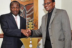 Minister of Performance Monotoring and Evaluation and Administration in The presidency Collins Chabane receives a plaque from the CEO of Southern African Music Rights Organisation (SAMRO) Nicholas Motsatse, in recognition of being the first member of SAMRO to achieve this office. 05/11/2010  