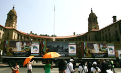 Truck drives part the Union Buildings